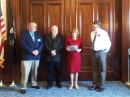 New Hampshire Gov Maggie Hassan proclaims June as Amateur Radio month. (L-R) CAARES PIO Don Curtis, N1ZIH, New Hampshire PIC Larry Beagle, KB1WTJ, Gov Hassan, and New Hampshire SM Peter Stohrer, K1PJS. 